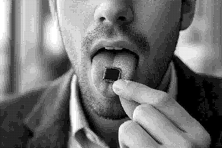 man putting microchip on his tongue. loft pixelated photo