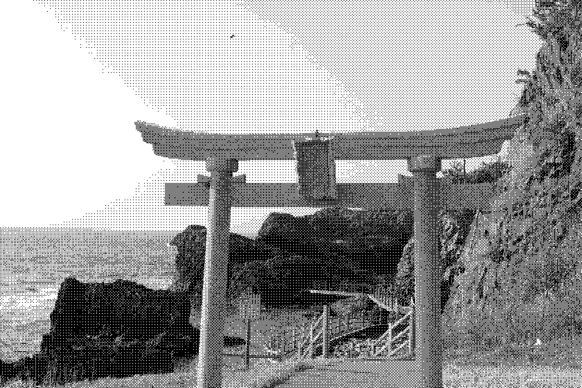 a tori gate, with an ocean view on the side of a cliff
